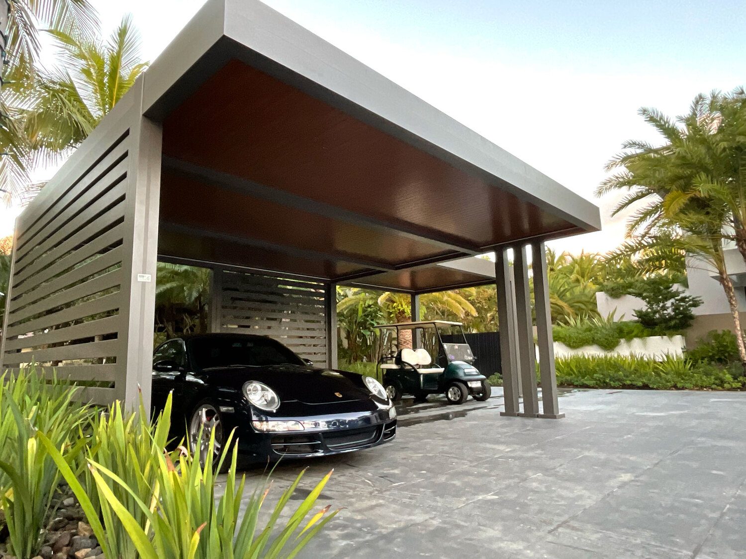 Modern carport with sleek design protecting vehicles, Portland Window Coverings in Tigard, OR